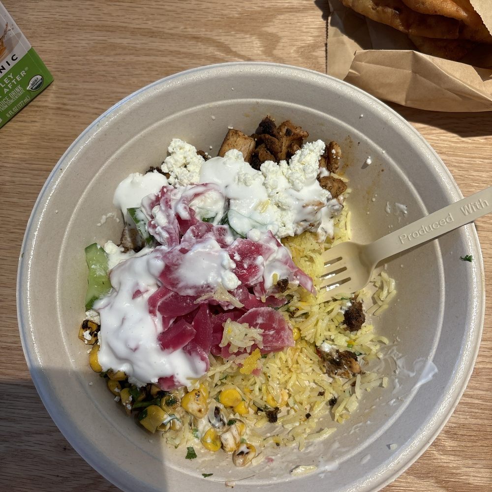 CAVA - Bowl with rice, chicken, cucumber, corn, feta, and garlic dressing - Mediterranean Near Me - Secaucus, New Jersey CAVA - Bowl with rice, chicken, cucumber, corn, feta, and garlic dressing - Mediterranean Near Me - Secaucus, New Jersey