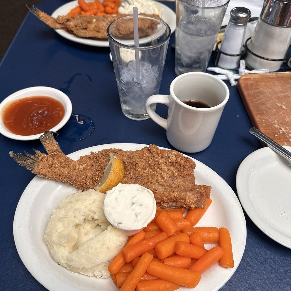Carriage Crossing Restaurant and Bakery - Catfish lunch w/ steamed carrots and mashed potatoes with brown gravy on the side. - Bakeries Near Me - Yoder, Kansas Carriage Crossing Restaurant and Bakery - Catfish lunch w/ steamed carrots and mashed potatoes with brown gravy on the side. - Bakeries Near Me - Yoder, Kansas