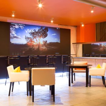 Evolve Chiropractic & Wellness - Relax when you arrive and enjoy our large screen entertainment until your session starts - Chiropractors Near Me - Boston, Massachusetts