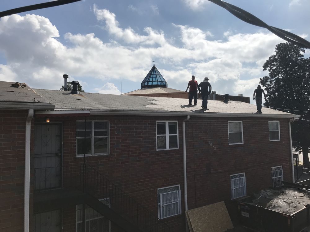 Slide of Merk Roofing