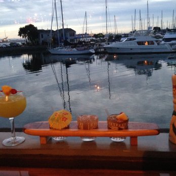 Trader Vic's - Tiki time with a view of the harbor at Trader Vic’s in Emeryville. - Hawaiian Near Me - Emeryville, California Trader Vic's - Tiki time with a view of the harbor at Trader Vic’s in Emeryville. - Hawaiian Near Me - Emeryville, California
