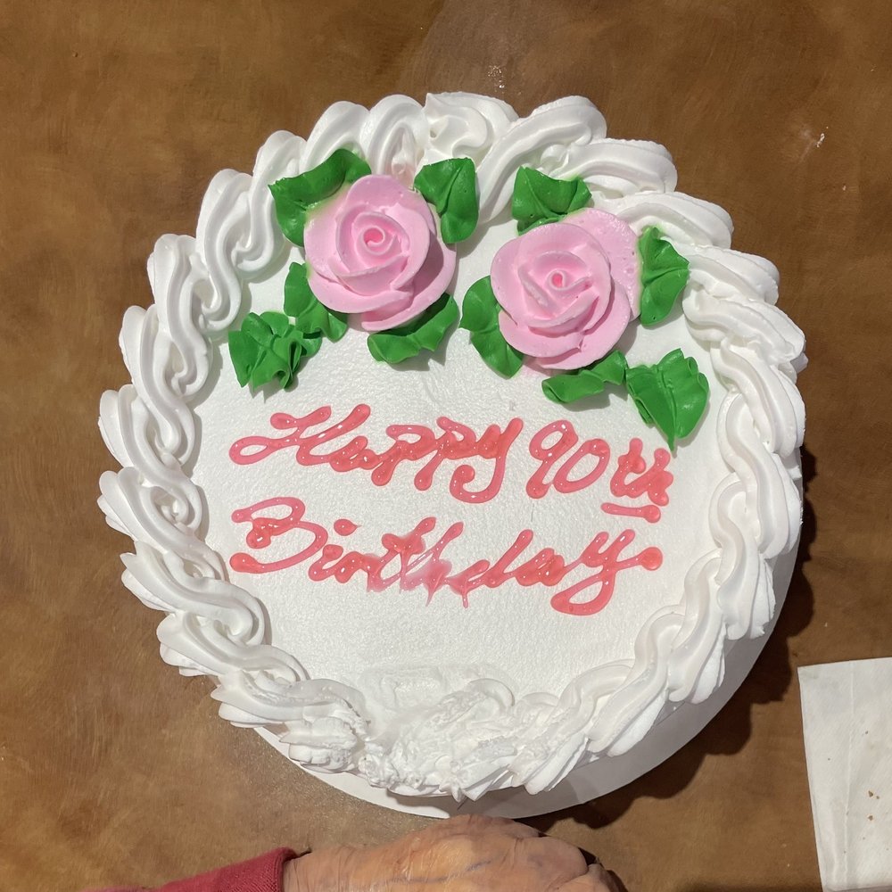 Vanilla cake and frosting with pink roses and fresh strawberries inside. Simple, but really good. Vanilla cake and frosting with pink roses and fresh strawberries inside. Simple, but really good.
