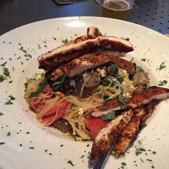 Yard House - Angel Hair pasta with blackened chicken. - New American Near Me - Tucson, Arizona Yard House - Angel Hair pasta with blackened chicken. - New American Near Me - Tucson, Arizona