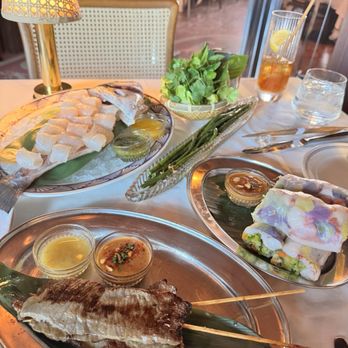 Twin Tails - Steak satay, lobster summer rolls, long beans, whole dorado sashimi - Thai Near Me - New York, New York Twin Tails - Steak satay, lobster summer rolls, long beans, whole dorado sashimi - Thai Near Me - New York, New York