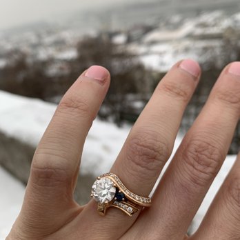 Alex & Company - My beautiful custom engagement ring by Alex: pink gold, diamonds and my grandma's sapphire, sparkling against snowy castles in Budapest! - Jewelry Near Me - Newton, Massachusetts