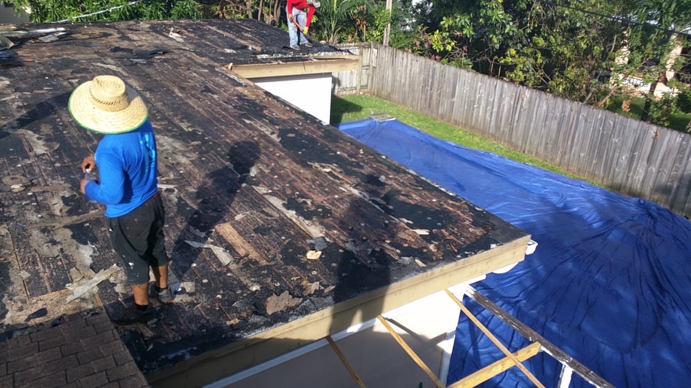 Slide of Riggs Roofing