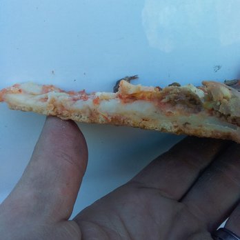 Top Shelf Pizza - hard to see but thats not cheese is a layer of raw dough - Pizza Near Me - Honeoye, New York Top Shelf Pizza - hard to see but thats not cheese is a layer of raw dough - Pizza Near Me - Honeoye, New York