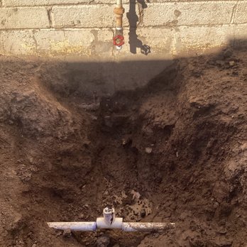 Hansen Family - Before B. We dug up the hole, removed the steel existing pipe and riser, cut out the PVC coupler, in preparation for the tech. - Plumbing Near Me - Mesa, Arizona Hansen Family - Before B. We dug up the hole, removed the steel existing pipe and riser, cut out the PVC coupler, in preparation for the tech. - Plumbing Near Me - Mesa, Arizona