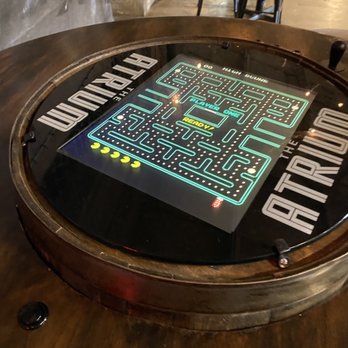 Fire on Fifth - a table with a game on it - Pizza Near Me - Peru, Illinois