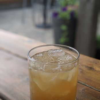 Spilt Milk - a drink on a wooden table - Cocktail Bars Near Me - Chicago, Illinois
