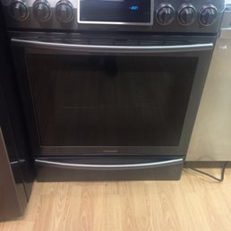 Slide in gas range