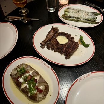 The Committee Chophouse - Loaded Baked Potato, Cowboy Cut Ribeye*, Grilled Asparagus - Cocktail Bars Near Me - Omaha, Nebraska The Committee Chophouse - Loaded Baked Potato, Cowboy Cut Ribeye*, Grilled Asparagus - Cocktail Bars Near Me - Omaha, Nebraska