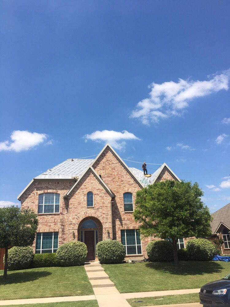 Slide of Chago's Roofing