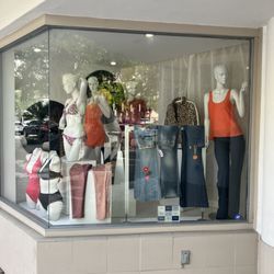 Curves N Waves - Store front window of our current location.