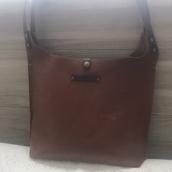 Kurier - Leather purse from Kurier. This is after years of less than light use, including carrying construction equipment at times.