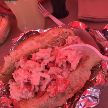 James Hook & Co - Awesome lobster roll. Forgive the red hue which is from the red umbrella overhead on a sunny day. - Seafood Near Me - Boston, Massachusetts James Hook & Co - Awesome lobster roll. Forgive the red hue which is from the red umbrella overhead on a sunny day. - Seafood Near Me - Boston, Massachusetts