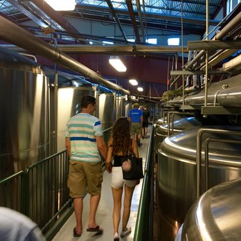 Deschutes Brewery Tasting Room - Walking through the canopy of fermentation tanks - Breweries Near Me - Bend, Oregon Deschutes Brewery Tasting Room - Walking through the canopy of fermentation tanks - Breweries Near Me - Bend, Oregon
