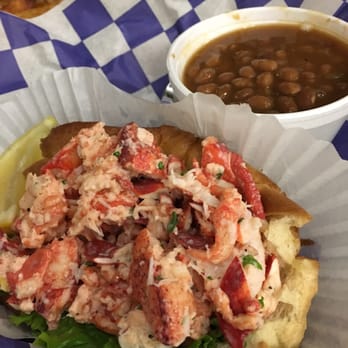 Cape Cod Fish - Classic lobstah roll with side of baked beans. $18 is so worth it. They really pack the lobster meat in that bun! - Seafood Near Me - Fort Myers, Florida Cape Cod Fish - Classic lobstah roll with side of baked beans. $18 is so worth it. They really pack the lobster meat in that bun! - Seafood Near Me - Fort Myers, Florida