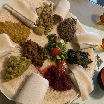 Little Africa - A combo meal for three. Plenty and we took home leftovers! - Ethiopian Near Me - Grand Rapids, Michigan Little Africa - A combo meal for three. Plenty and we took home leftovers! - Ethiopian Near Me - Grand Rapids, Michigan