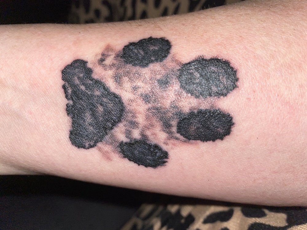 Nomadic Roots Tattoo Logo