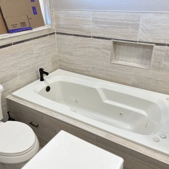 ISE Construction - New jacuzzi tub and tile backsplash - General Contractors Near Me