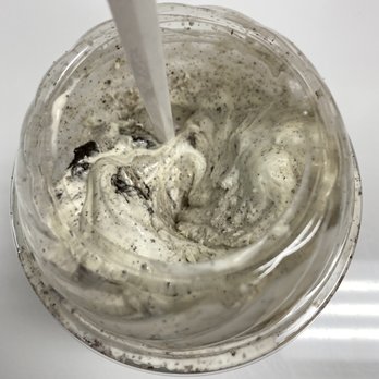 Carvel - a spoon sticking out of a jar of cream - Ice Cream & Frozen Yogurt Near Me - Port Washington, New York
