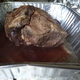 a piece of meat in a foil pan