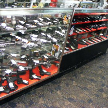 Tony's Jewelry & Loan - We are also an FFL dealer and usually stock 800 new & used firearms. Pictured is one of the 3 showcases of handguns. - Jewelry Near Me - Dubuque, Iowa Tony's Jewelry & Loan - We are also an FFL dealer and usually stock 800 new & used firearms. Pictured is one of the 3 showcases of handguns. - Jewelry Near Me - Dubuque, Iowa