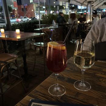 Bacari GDL - Outdoor patio area with our unlimited drinks! White wine and sangria pictured - Mediterranean Near Me - Glendale, California