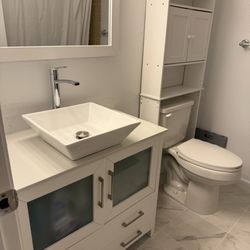 Build Up Northwest - Installed vanity, mirror, flooring and paint. Not shown is new medicine cabinet