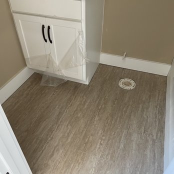 Outlook Flooring - a bathroom with a sink and toilet - Carpet Installation Near Me - Monroe, North Carolina Outlook Flooring - a bathroom with a sink and toilet - Carpet Installation Near Me - Monroe, North Carolina