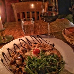 Italiensk risotto med kött och gott vin från Italien