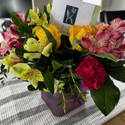 Kremp Florist - Order that he got three roses One carnation. What I ordered had six roses ribbons and a larger base