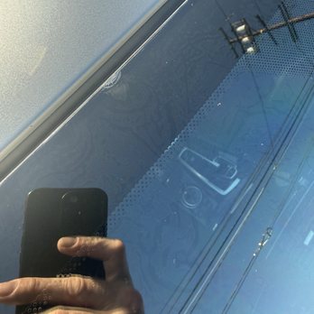 Speedy Auto Tint - This was some kind of a crack or crease/bubble that was at the top of my windshield dead Center after the install. - Car Window Tinting Near Me - Bellflower, California Speedy Auto Tint - This was some kind of a crack or crease/bubble that was at the top of my windshield dead Center after the install. - Car Window Tinting Near Me - Bellflower, California