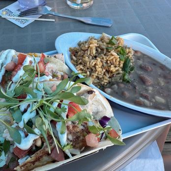 Sandbar Seafood & Spirits - Grouper Tacos comes with side of rice/beans - very good! - Seafood Near Me - Anna Maria, Florida Sandbar Seafood & Spirits - Grouper Tacos comes with side of rice/beans - very good! - Seafood Near Me - Anna Maria, Florida