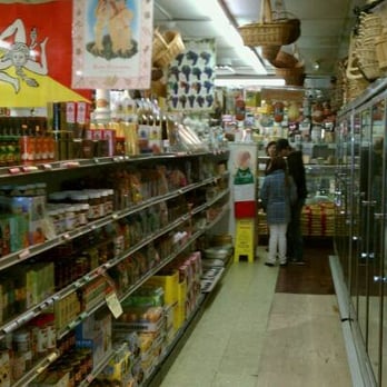 Lombardi's Imports - a man in a grocery store - International Grocery Near Me - Syracuse, New York