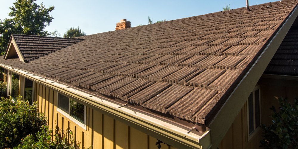 Slide of RT Roofing Specialist