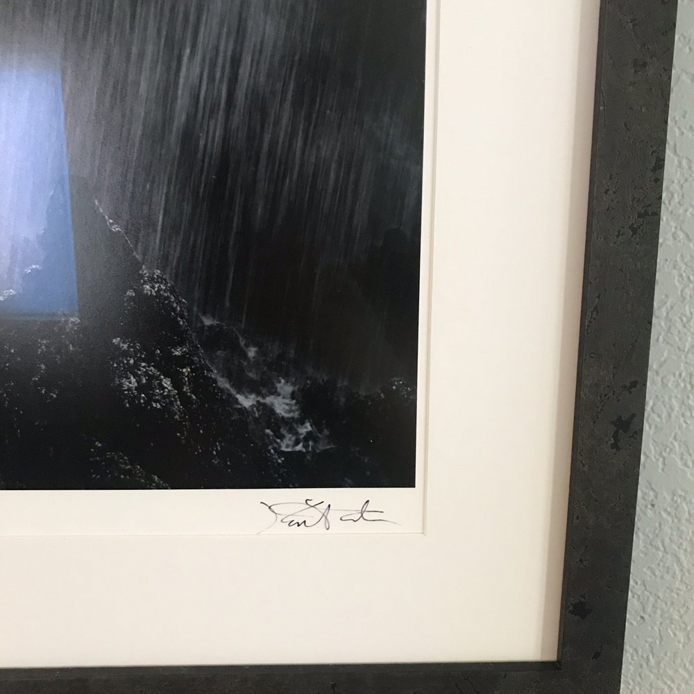 Scott helped me pick out a frame that mimicked the craggy cliffs in the photo and found a way to show the signature too Scott helped me pick out a frame that mimicked the craggy cliffs in the photo and found a way to show the signature too