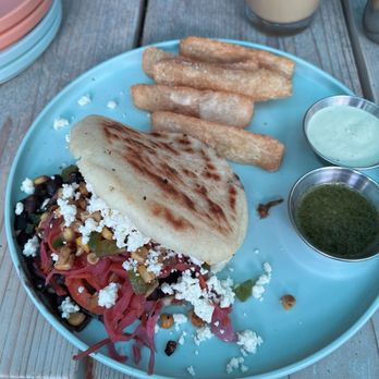 Hola Arepa - Black Bean & Queso Fresco Arepa - Latin American Near Me - Minneapolis, Minnesota Hola Arepa - Black Bean & Queso Fresco Arepa - Latin American Near Me - Minneapolis, Minnesota