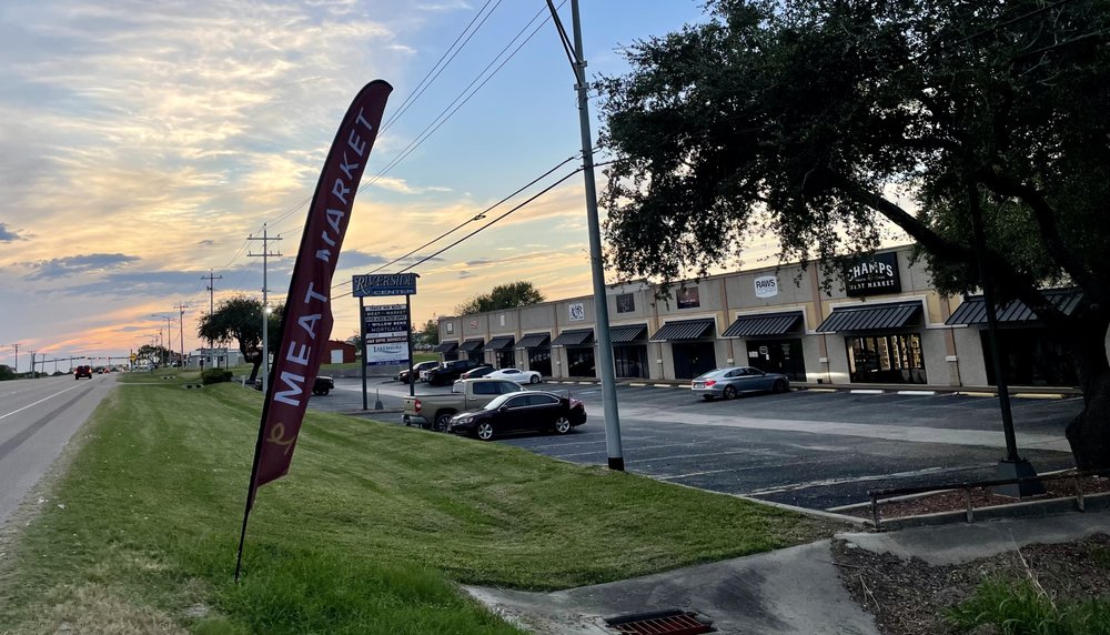 Champs Meat Market Logo