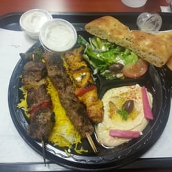 Kabob-Ster - 3 Kabob plate with basmati rice , greek salad and humus the Kabobs are chicken(my fave)  Kufta (ground lamb and beef) and beef .