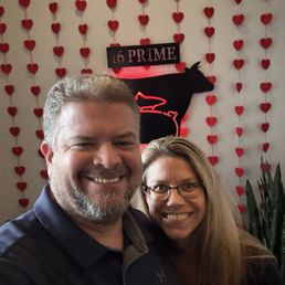 Us in front of the Valentine's Day decorations at 16 Prime.