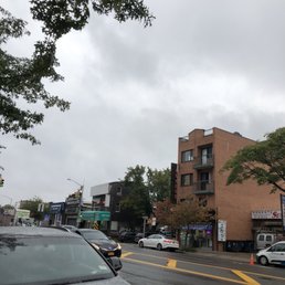 a street scene with cars and buildings