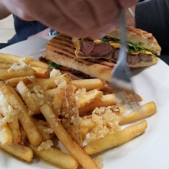 The HideAway Restaurant & Bar - Steak sandwich at lunch time! Comes with fries (chose garlic fries!) - Steakhouses Near Me - Battle Mountain, Nevada The HideAway Restaurant & Bar - Steak sandwich at lunch time! Comes with fries (chose garlic fries!) - Steakhouses Near Me - Battle Mountain, Nevada