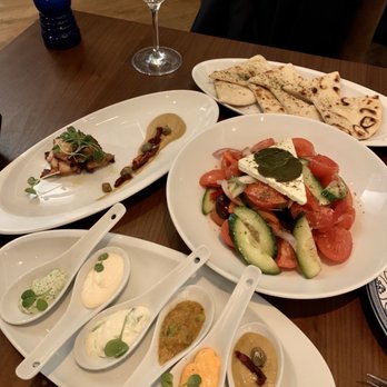 Hydra Estiatorio - Spread samplers, tomato salad and grilled octopus - Mediterranean Near Me - Vancouver, British Columbia