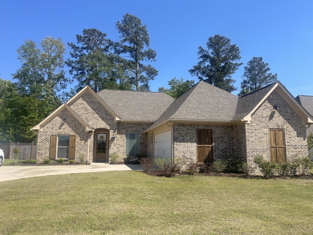 Slide of Scott Roofing