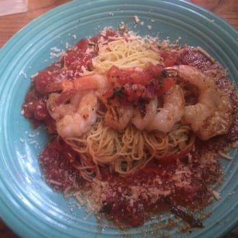 The Kill Devil Grill - Grilled shrimp with angel hair pasta and red sauce - American Near Me - Kill Devil Hills, North Carolina The Kill Devil Grill - Grilled shrimp with angel hair pasta and red sauce - American Near Me - Kill Devil Hills, North Carolina