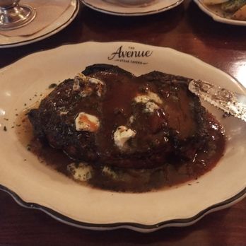The Avenue Steak Tavern - The pepper New York strip bone-in with peppercorn sauce and herb butter - Steakhouses Near Me - Columbus, Ohio The Avenue Steak Tavern - The pepper New York strip bone-in with peppercorn sauce and herb butter - Steakhouses Near Me - Columbus, Ohio