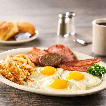 Jim's Restaurants - Rustler's Roundup - Three eggs, your style, with sausage, grilled ham and bacon. Diners choice of hash brows or southern-style grits. - American Near Me - San Antonio, Texas