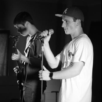 His Rock - two young men singing into microphones - Music Venues Near Me - Cumming, Georgia His Rock - two young men singing into microphones - Music Venues Near Me - Cumming, Georgia